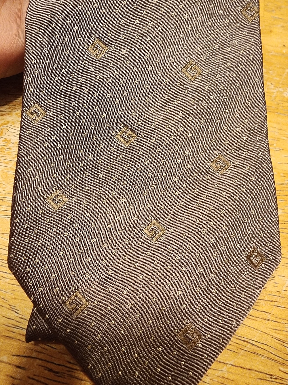 Gucci Brown Silk Tie with Subtle Gold Motif
